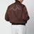 Bomber zippé marron en tissu technique