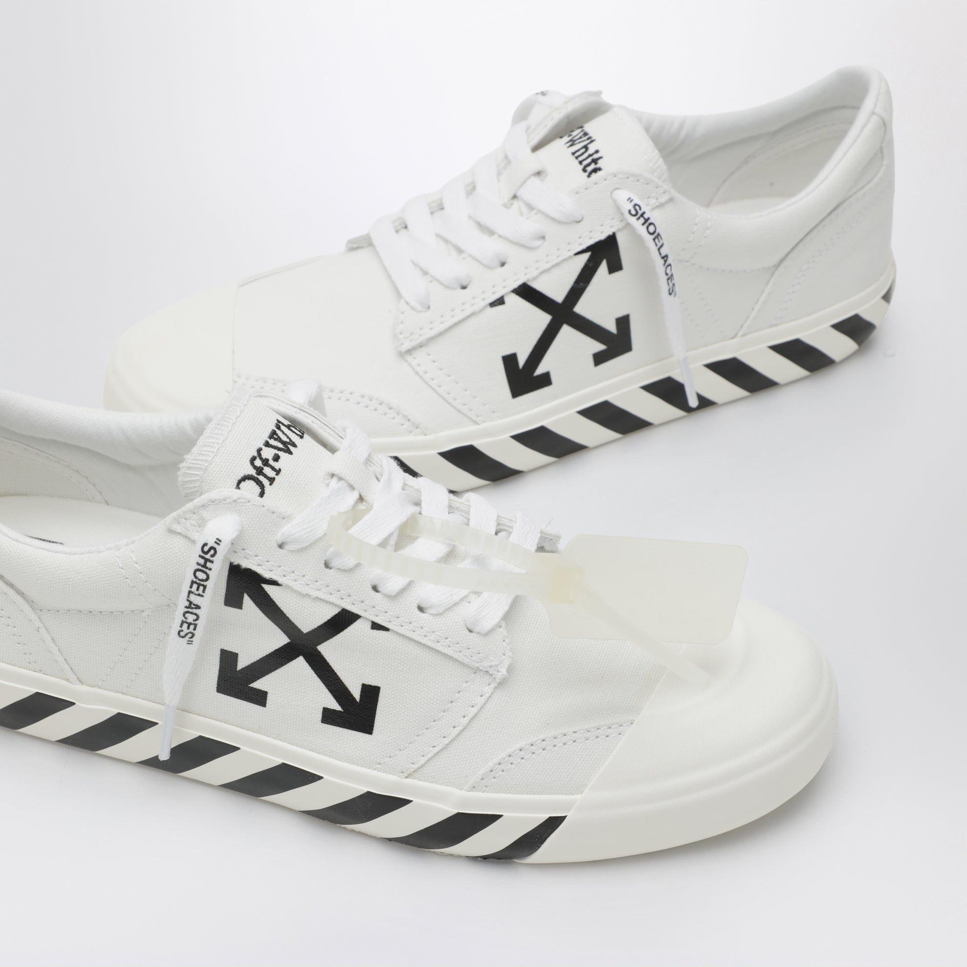 Sneakers Vulcanized con lacci in tessuto bianche