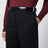 Black gabardine trousers with belt