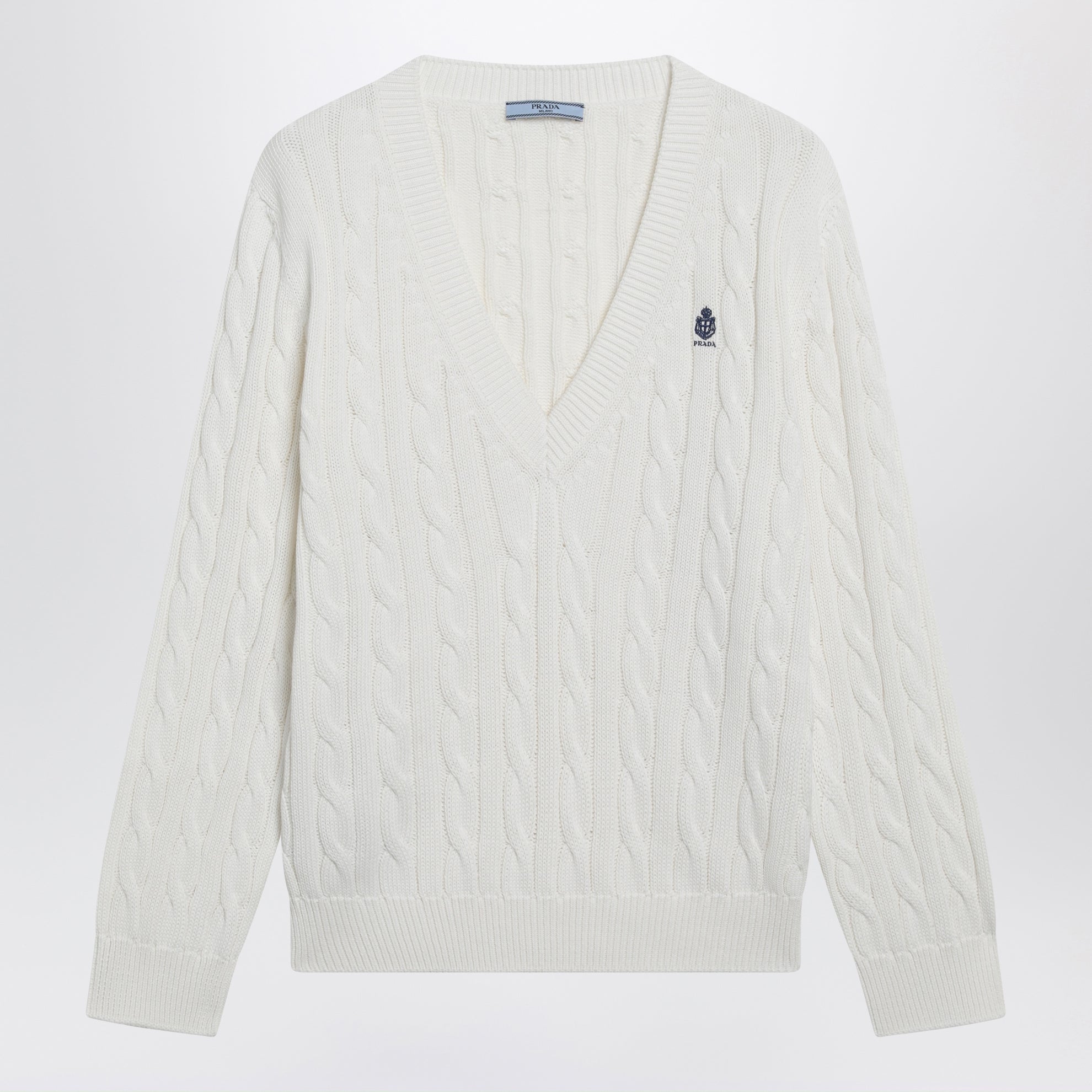 White cable-knit V-neck jumper