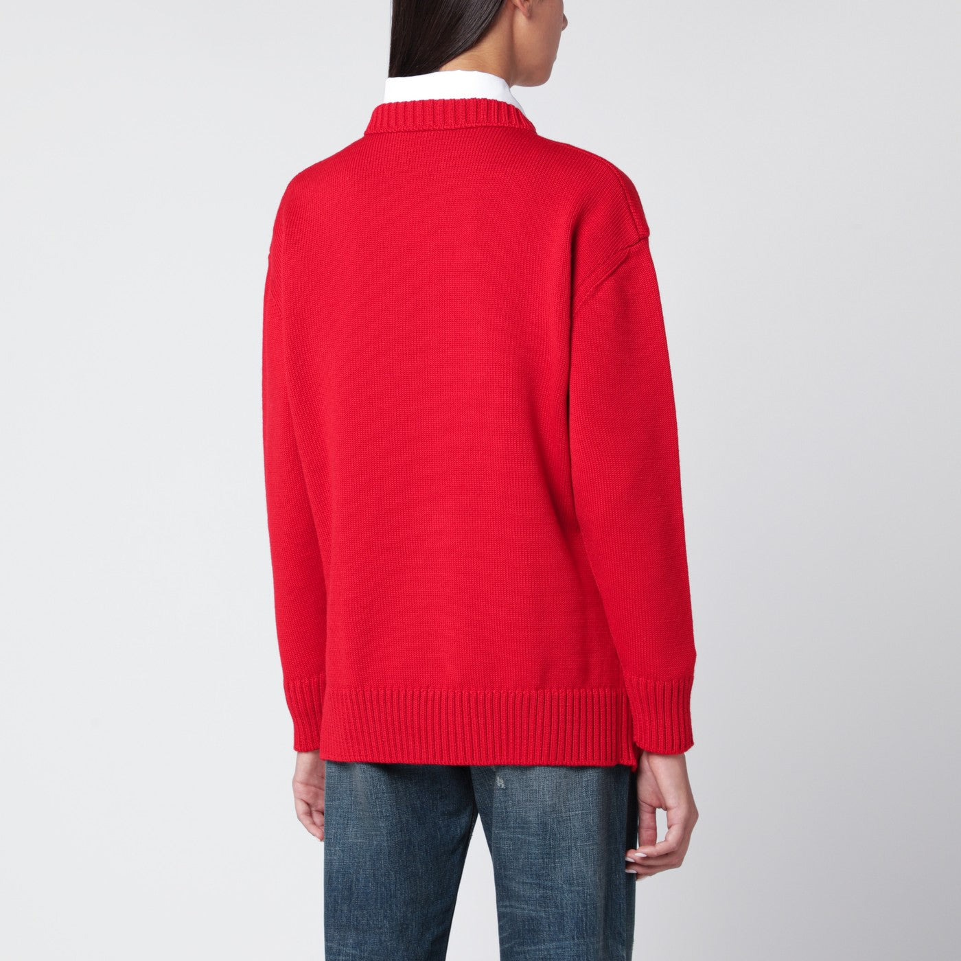 Maglione rosso in lana con fiocco