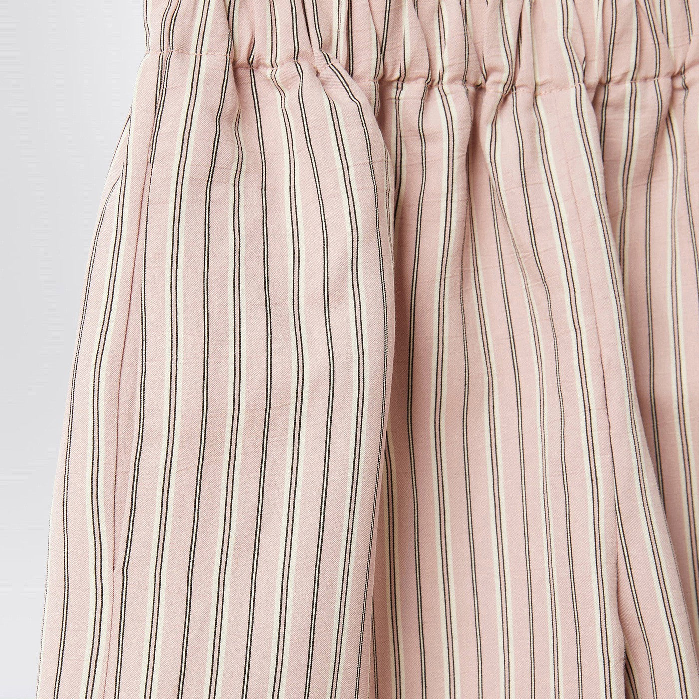 Completo rosa cipria a righe