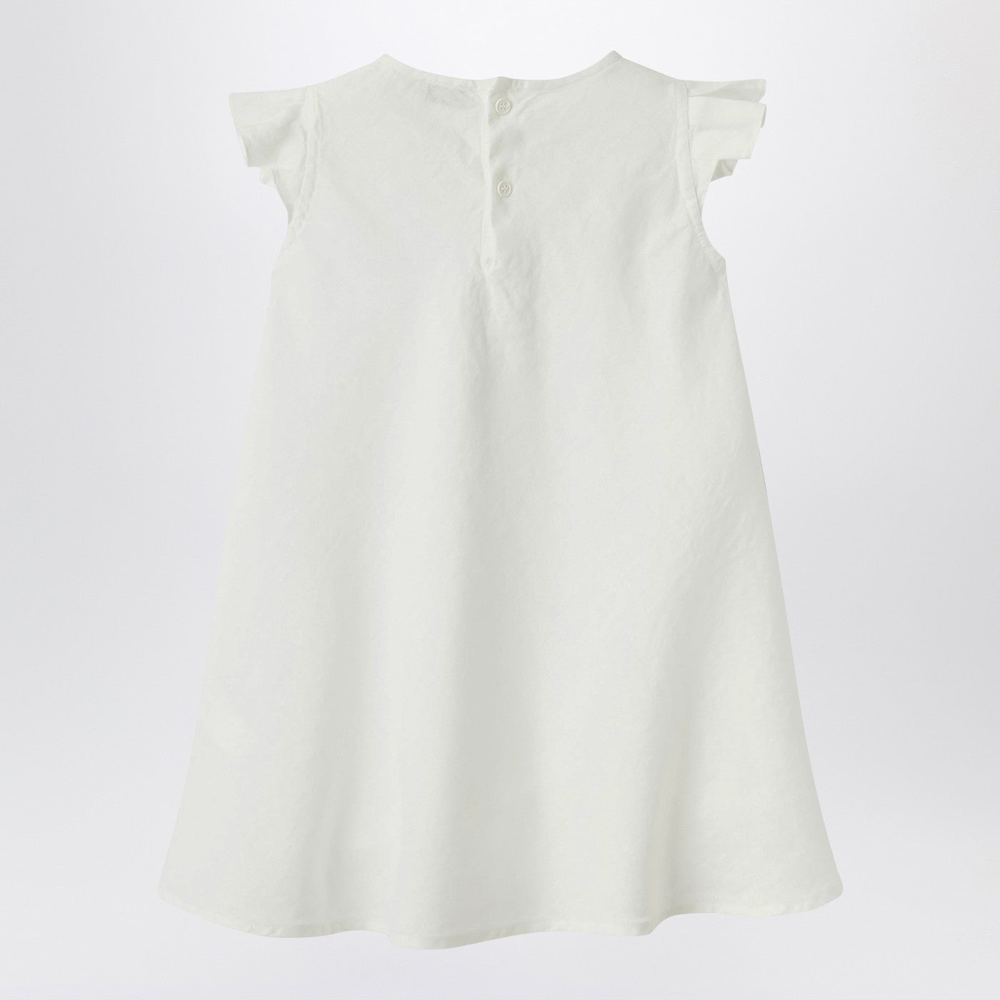 White linen dress with ruffles