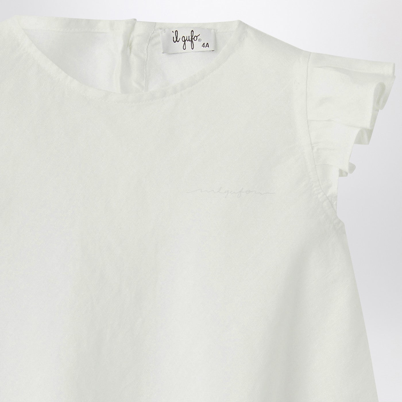 White linen dress with ruffles