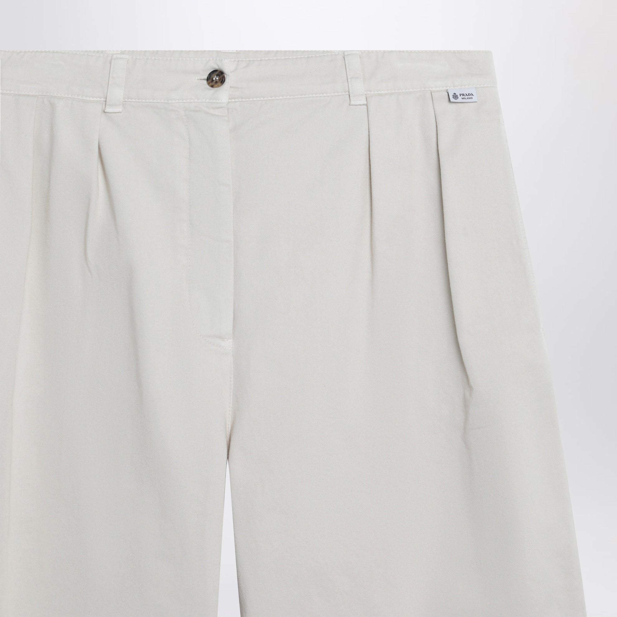 Sand-colored trousers in gabardine