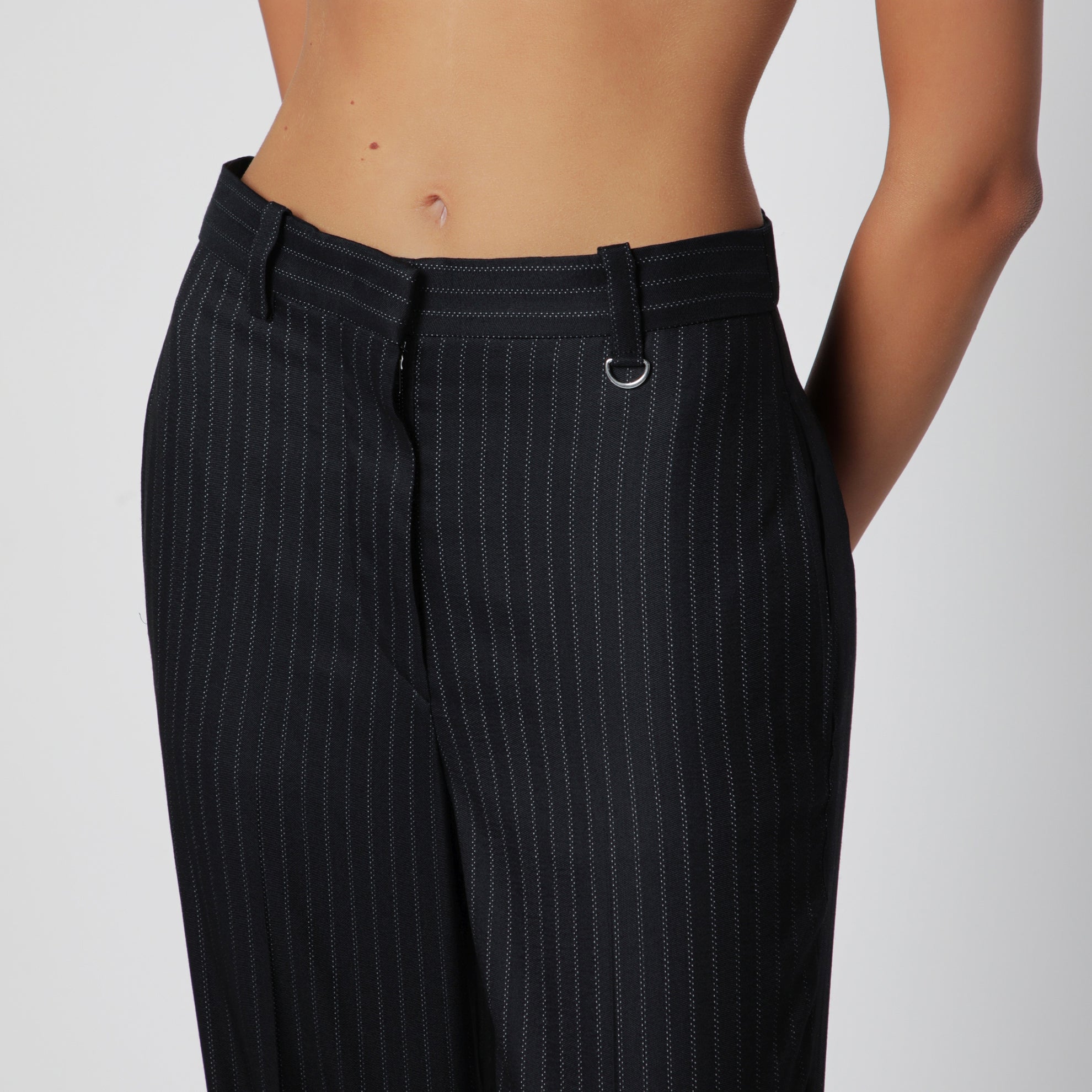 Black pinstripe wool-blend trousers