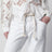 Pantaloni Alison kick flare in denim di cotone bianco