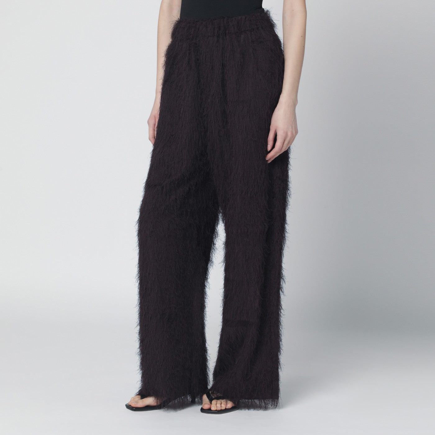 Dark brown fringed trousers