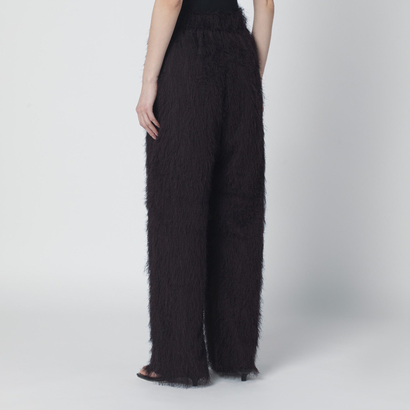 Dark brown fringed trousers