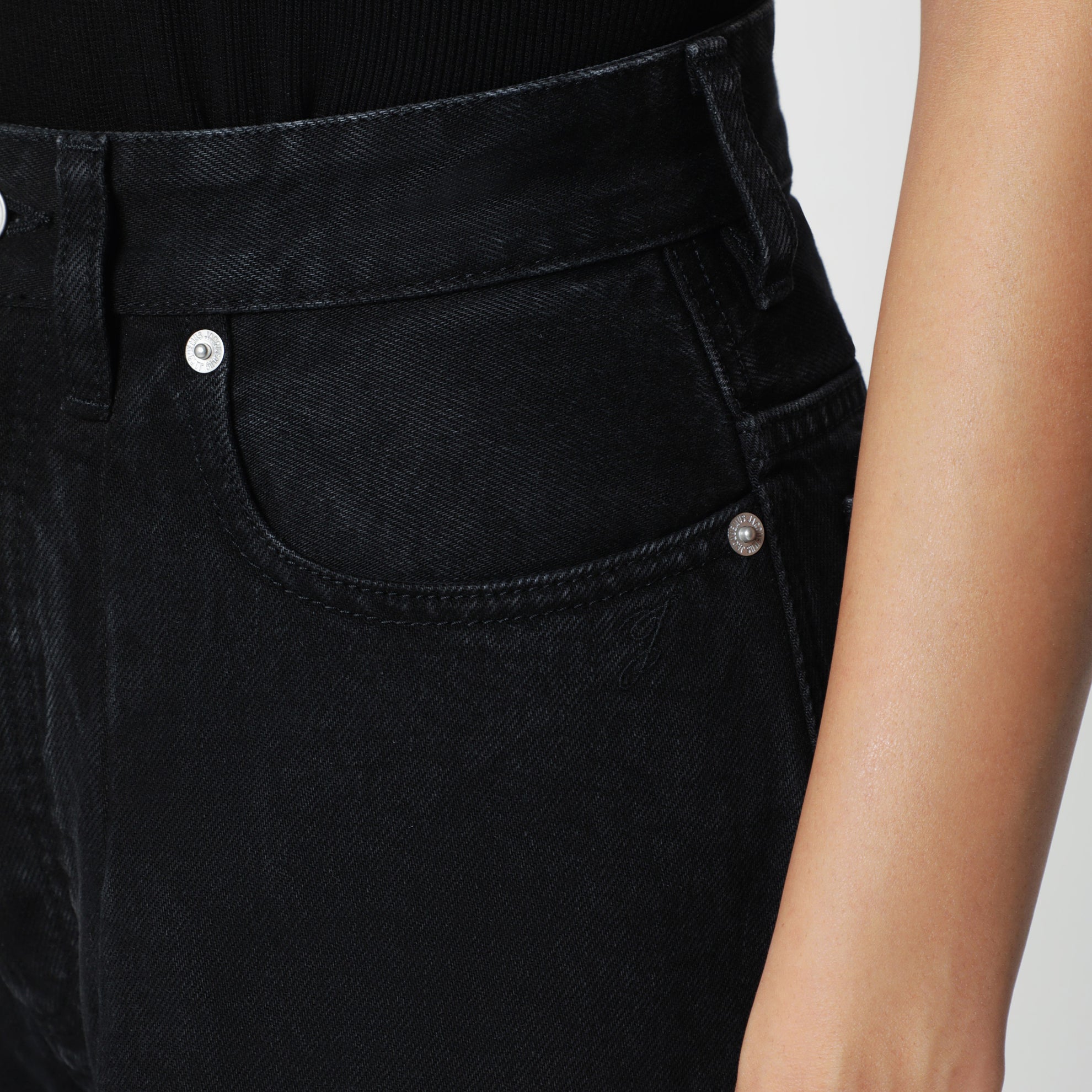 High-waisted black denim jeans