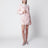 Veste bouclée rose à épaules structurées