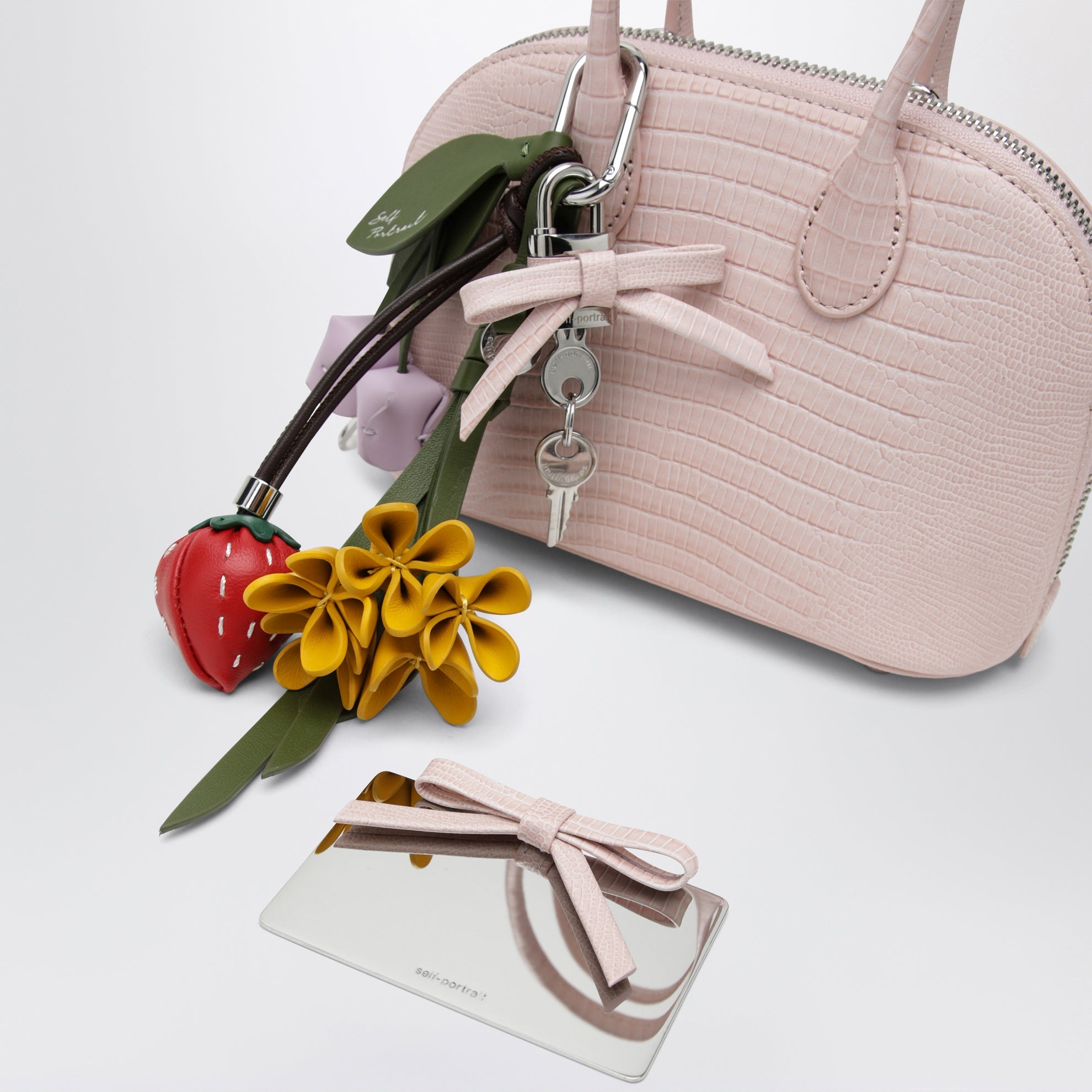 Mini sac bowling en cuir embossé rose