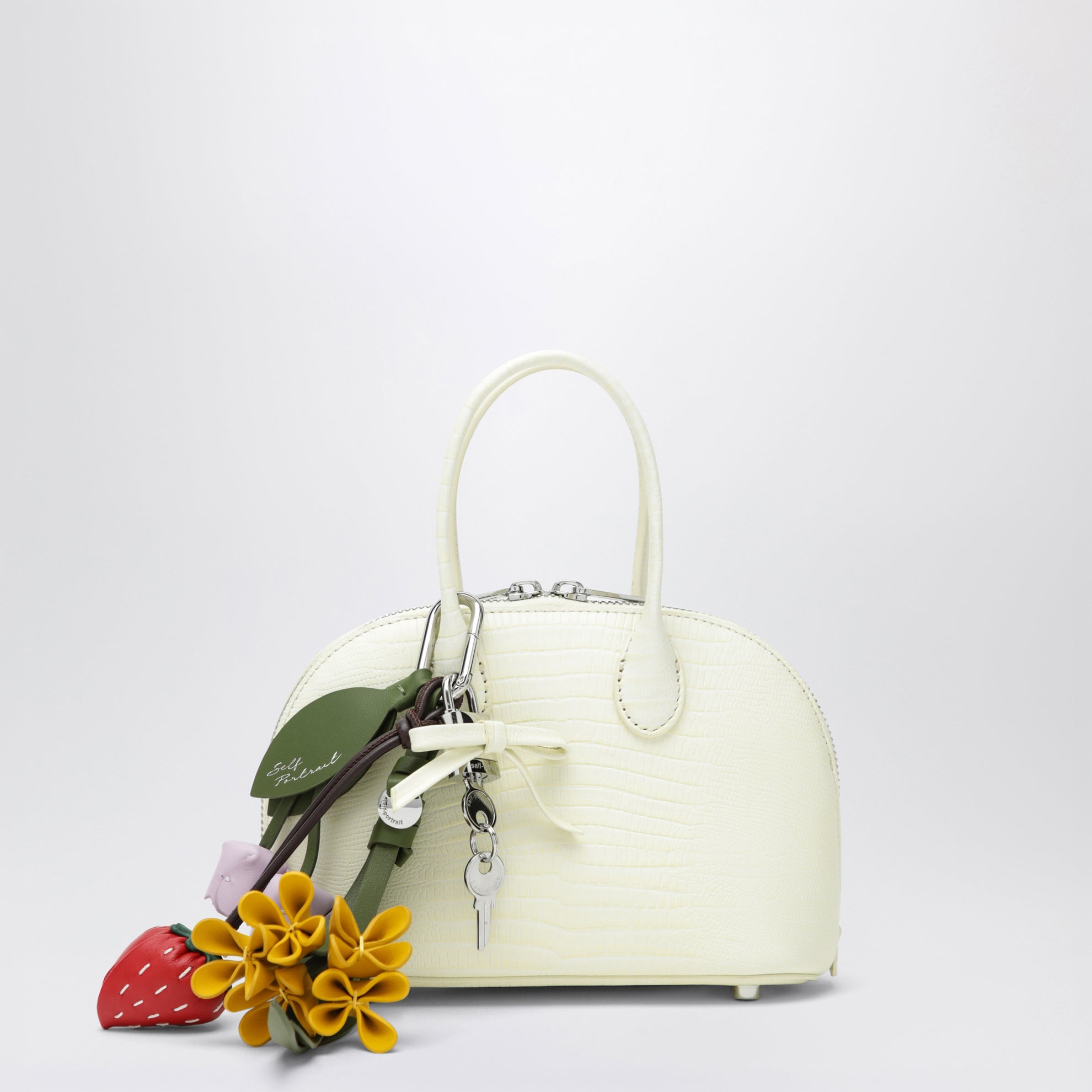 Mini sac bowling en cuir gaufré jaune