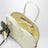Mini sac bowling en cuir gaufré jaune