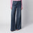 Jeans a vita alta con strisce di strass in denim blu