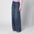 Jeans a vita alta con strisce di strass in denim blu