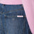 Jeans a vita alta con strisce di strass in denim blu