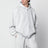 Light grey zip-up hooded sweatshirt in cotton fleece