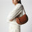 Oskan Moon shoulder bag in calfskin leather cognac