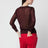 Pull en cupro noir et rouge Cenaya