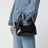 Sac bandoulière Baby Ninon noir effet cuir