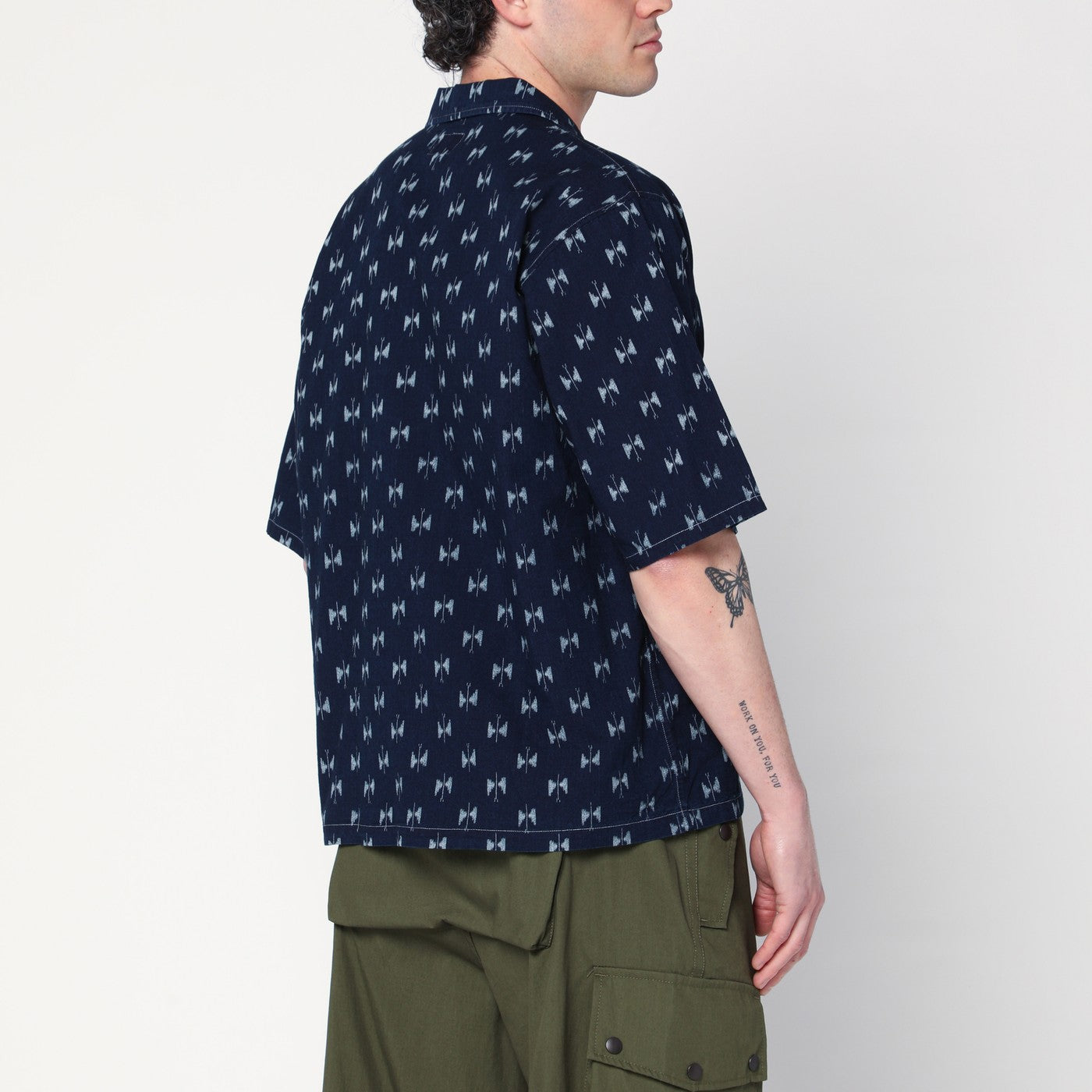 Blue denim shirt with bow ties