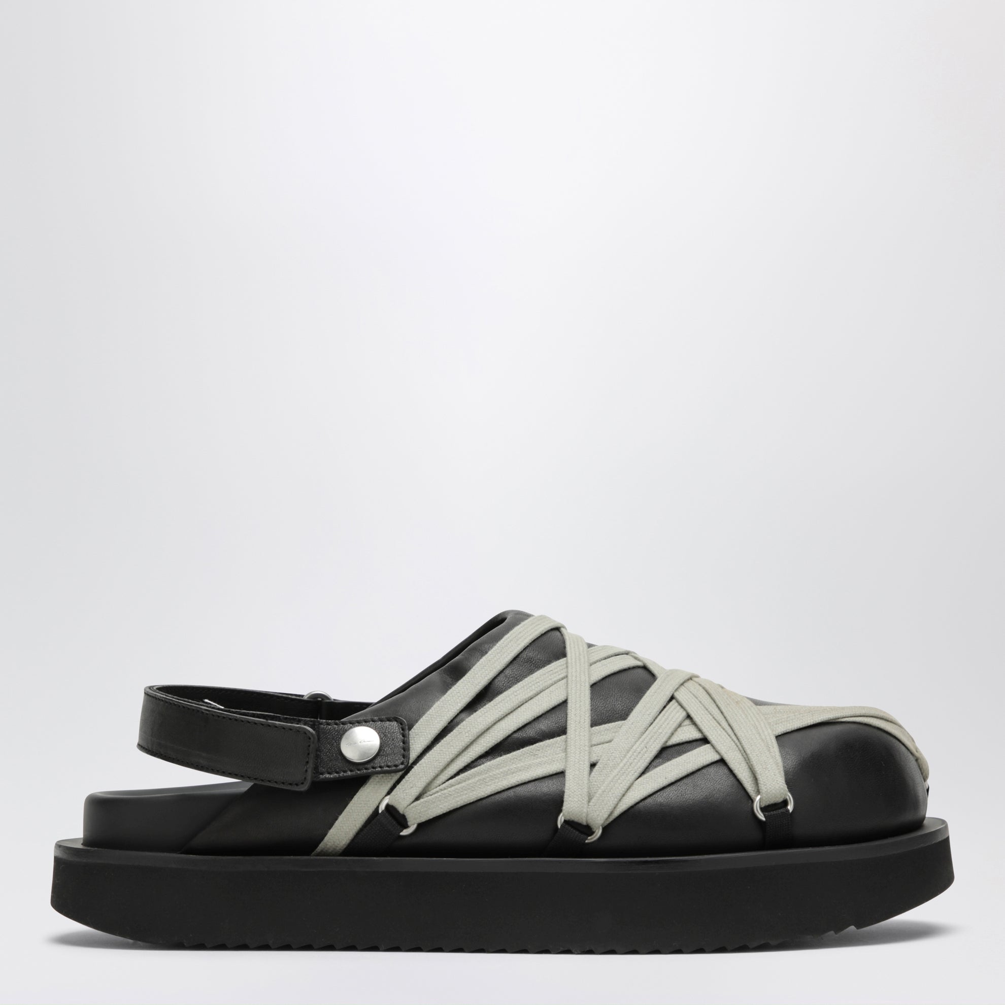 Sabots Megalace à lacets croisés en cuir noir