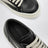 Sneaker Vintage nera/bianco latte