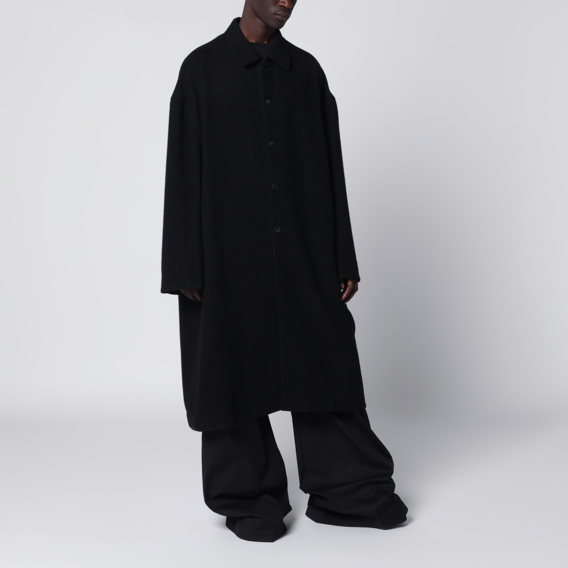 Long single-breasted virgin wool coat in black