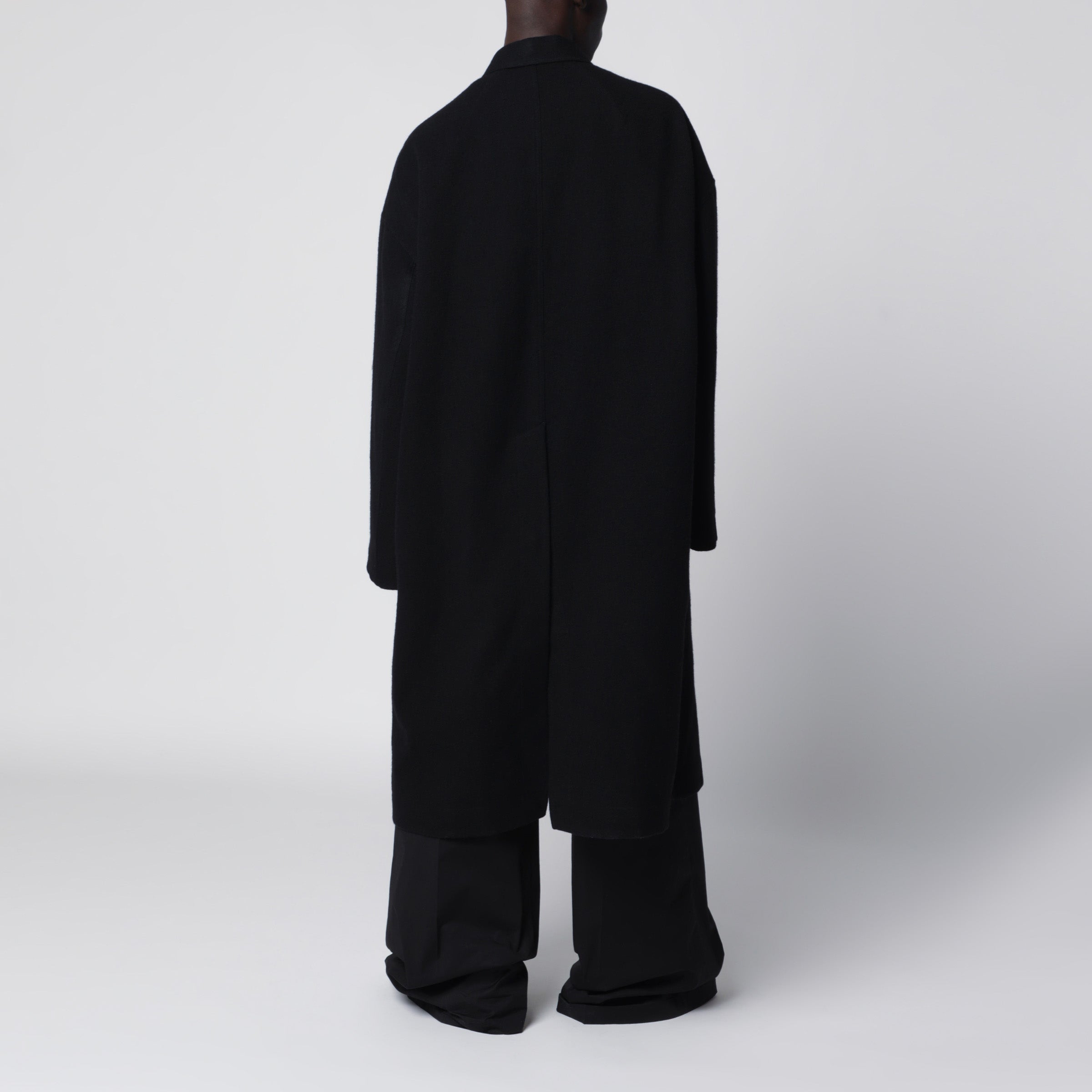 Rick Owens Long single-breasted virgin wool coat in black | TheDoubleF
