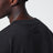 T-shirt Merch nera slavata in cotone