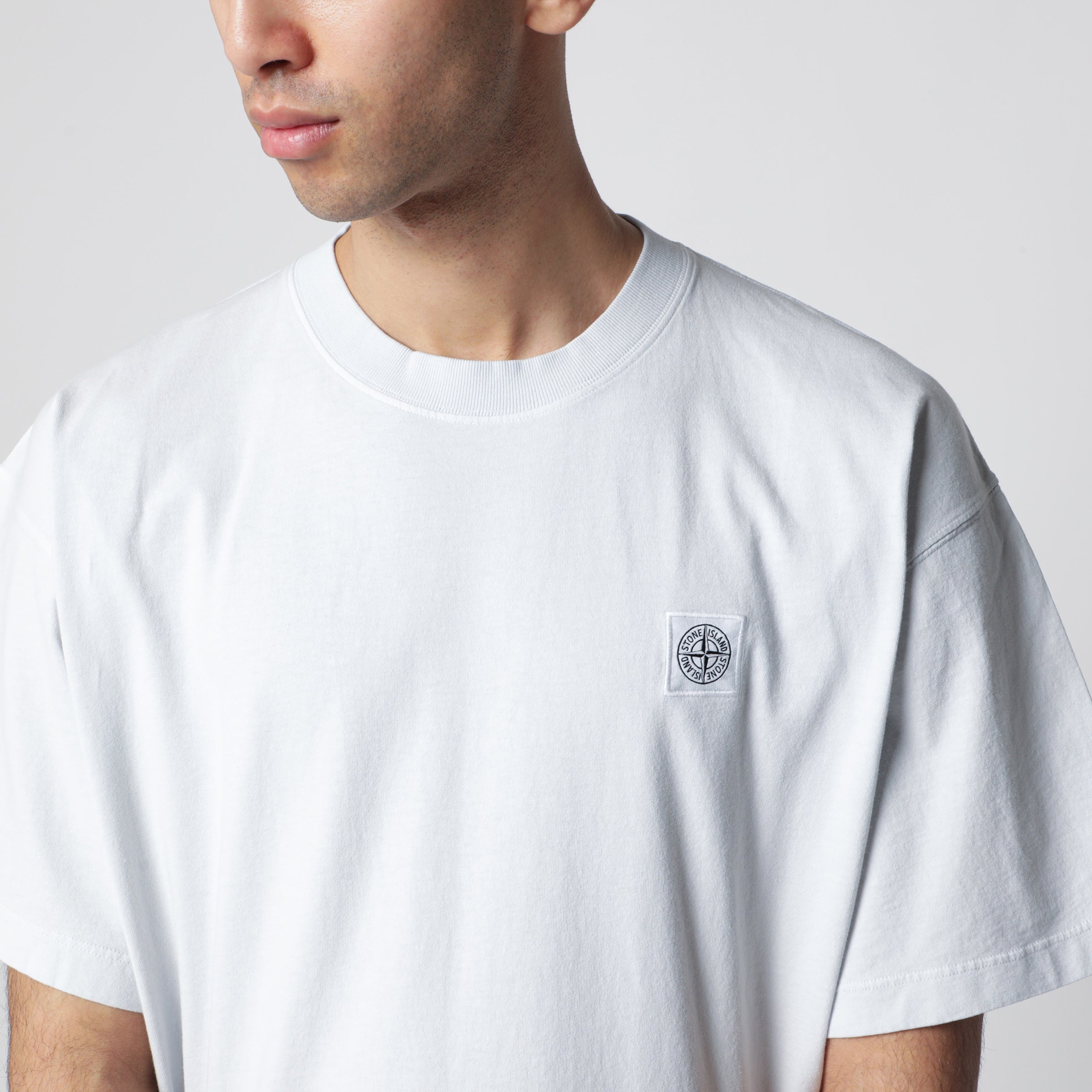 Stone Island Light blue T-shirt with Compass logo patch | TheDoubleF