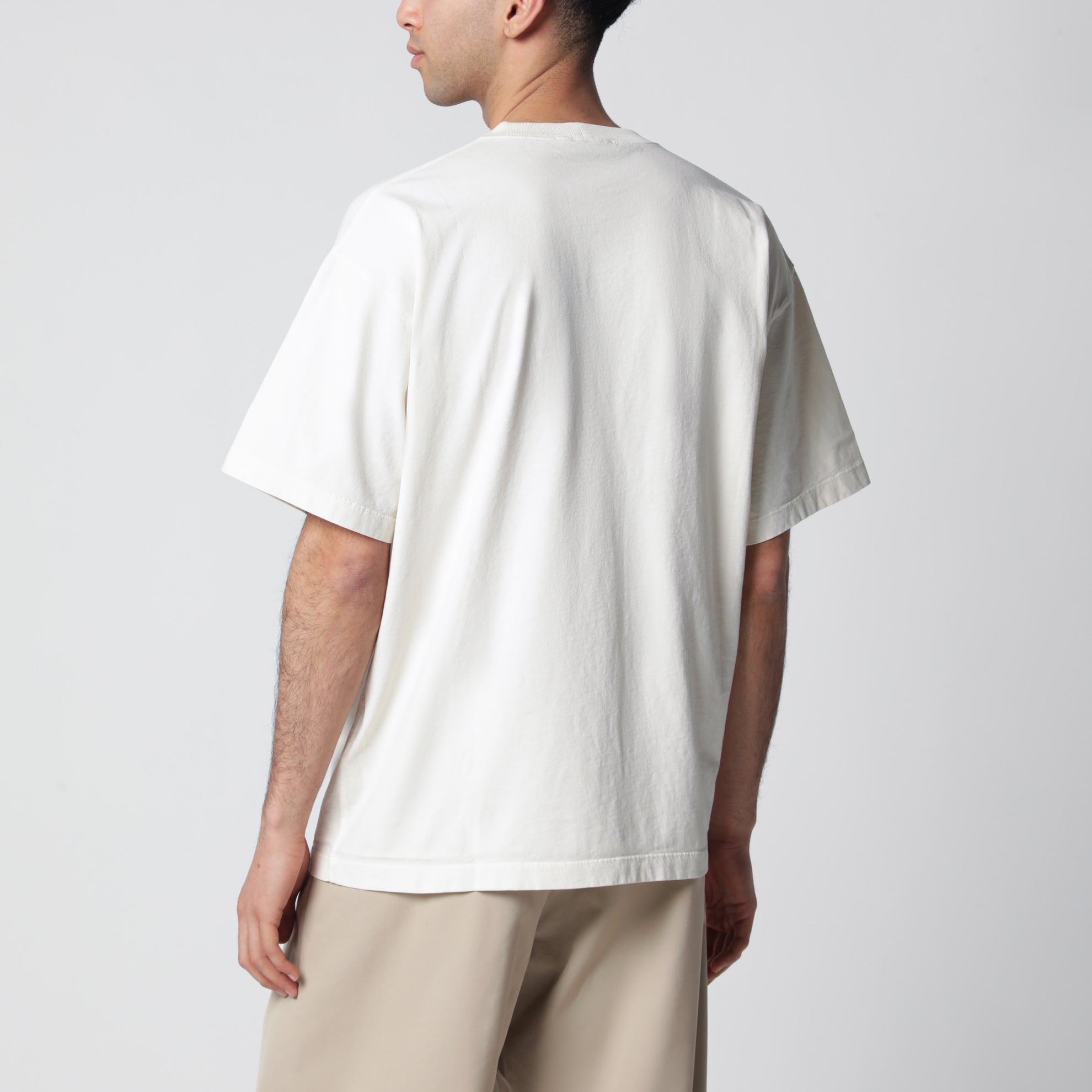 Ivory T-shirt with Compass logo patch
