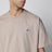 T-shirt color deserto con patch logo Compass