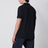 Navy blue polo with Compass logo patch