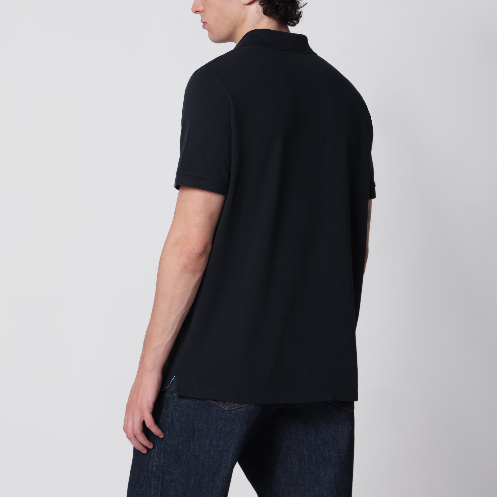 Navy blue polo with Compass logo patch