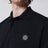 Navy blue polo with Compass logo patch