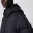 Black ripstop nylon zip-up down jacket