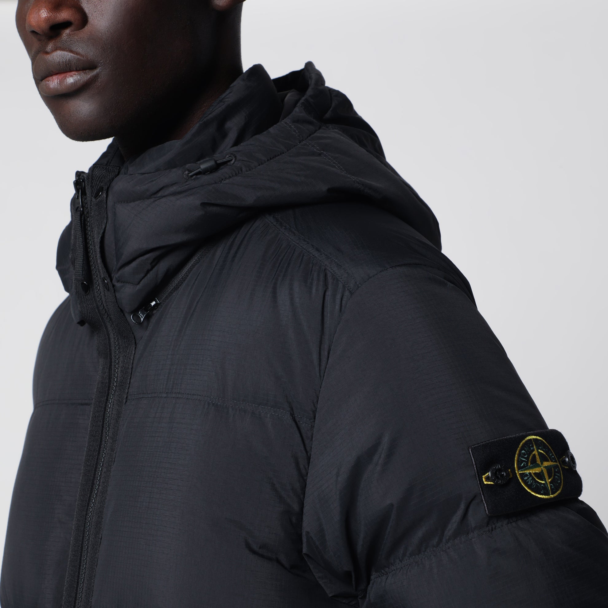 Black ripstop nylon zip-up down jacket