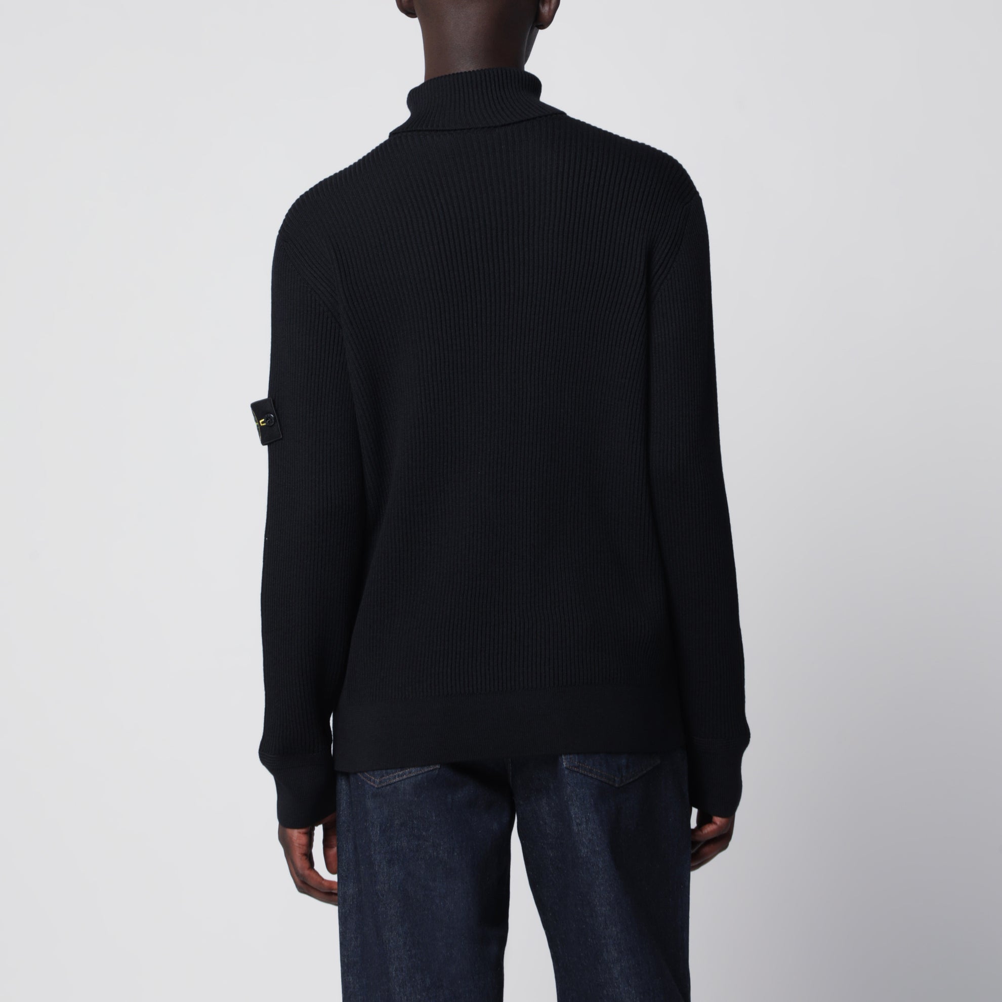 Navy blue ribbed turtleneck sweater