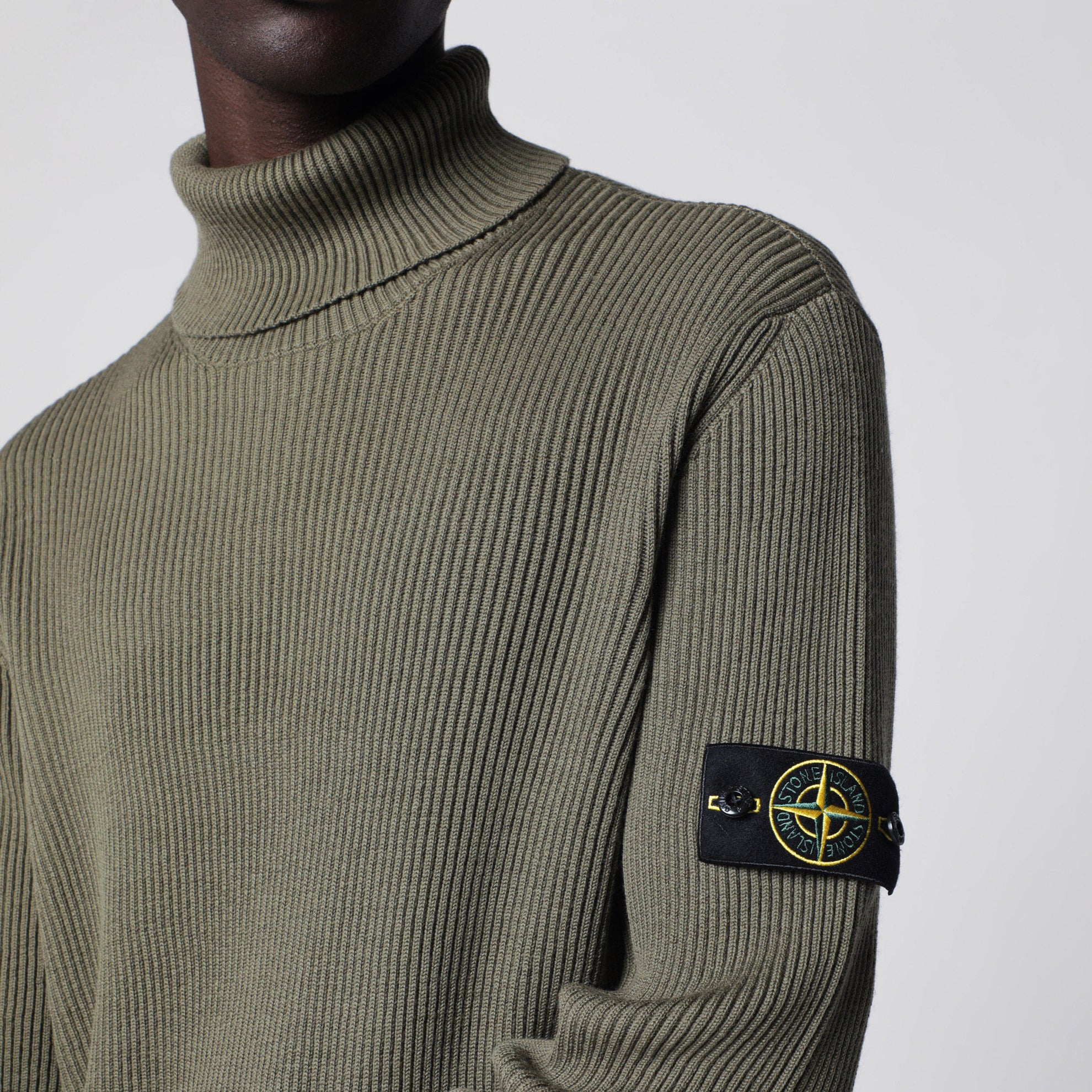 Military green ribbed turtleneck sweater