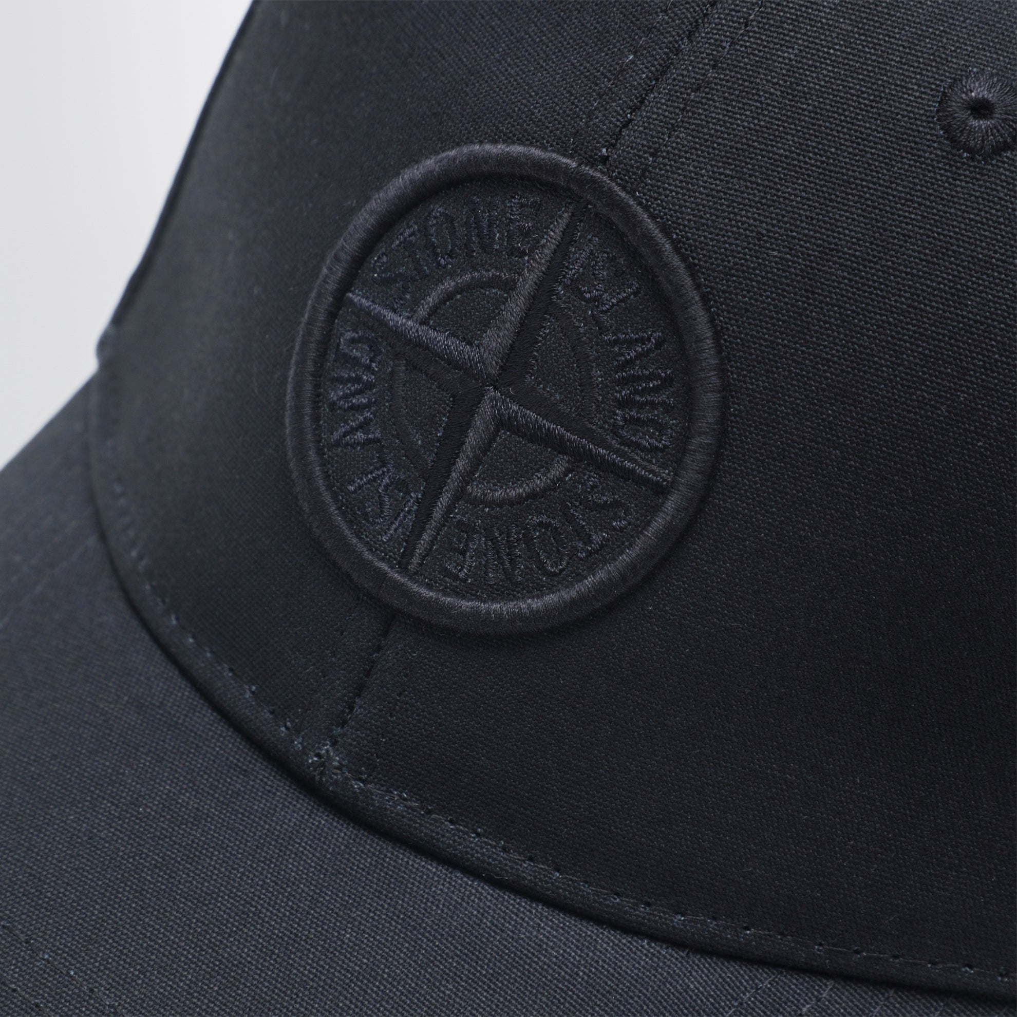 Navy blue baseball cap with logo