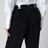 Black pants with tape-detail waistband