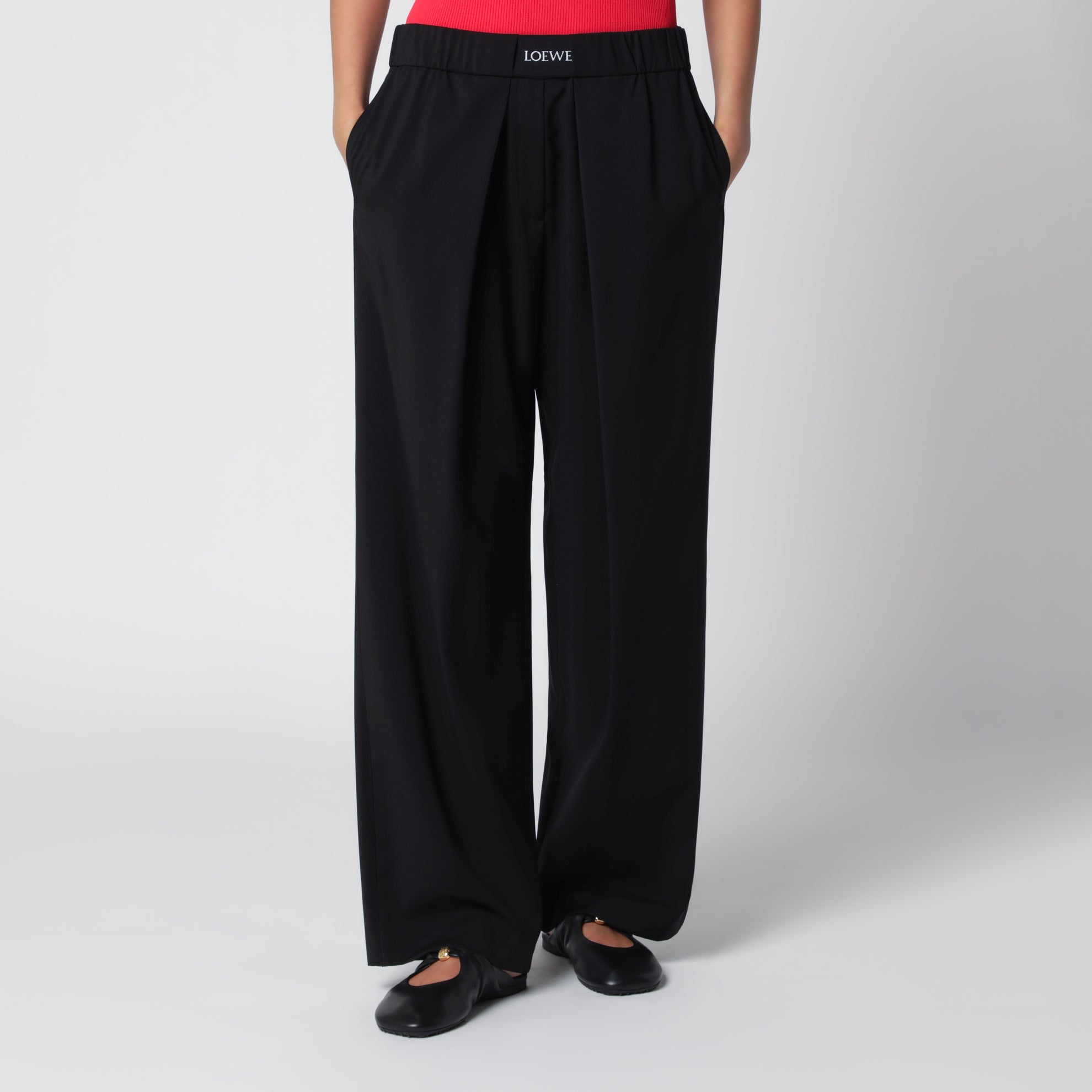 Elasticated wool trousers in black