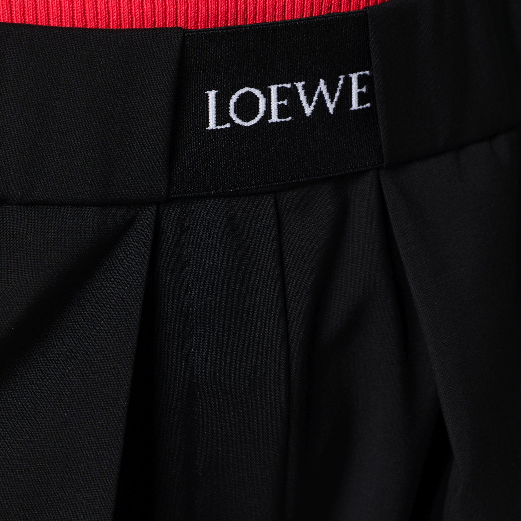 Elasticated wool trousers in black