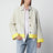 Light grey suede jacket with contrasting inserts