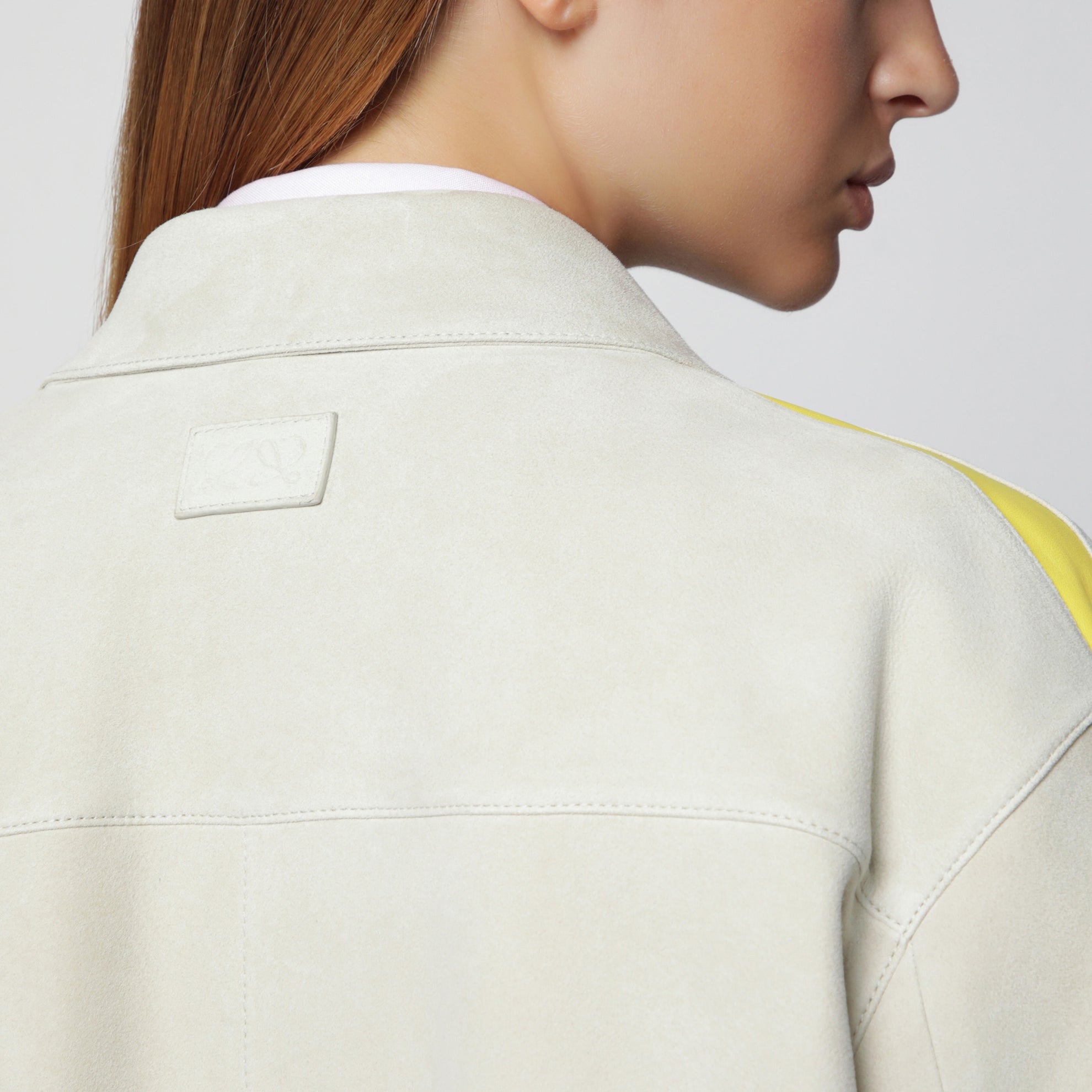 Light grey suede jacket with contrasting inserts