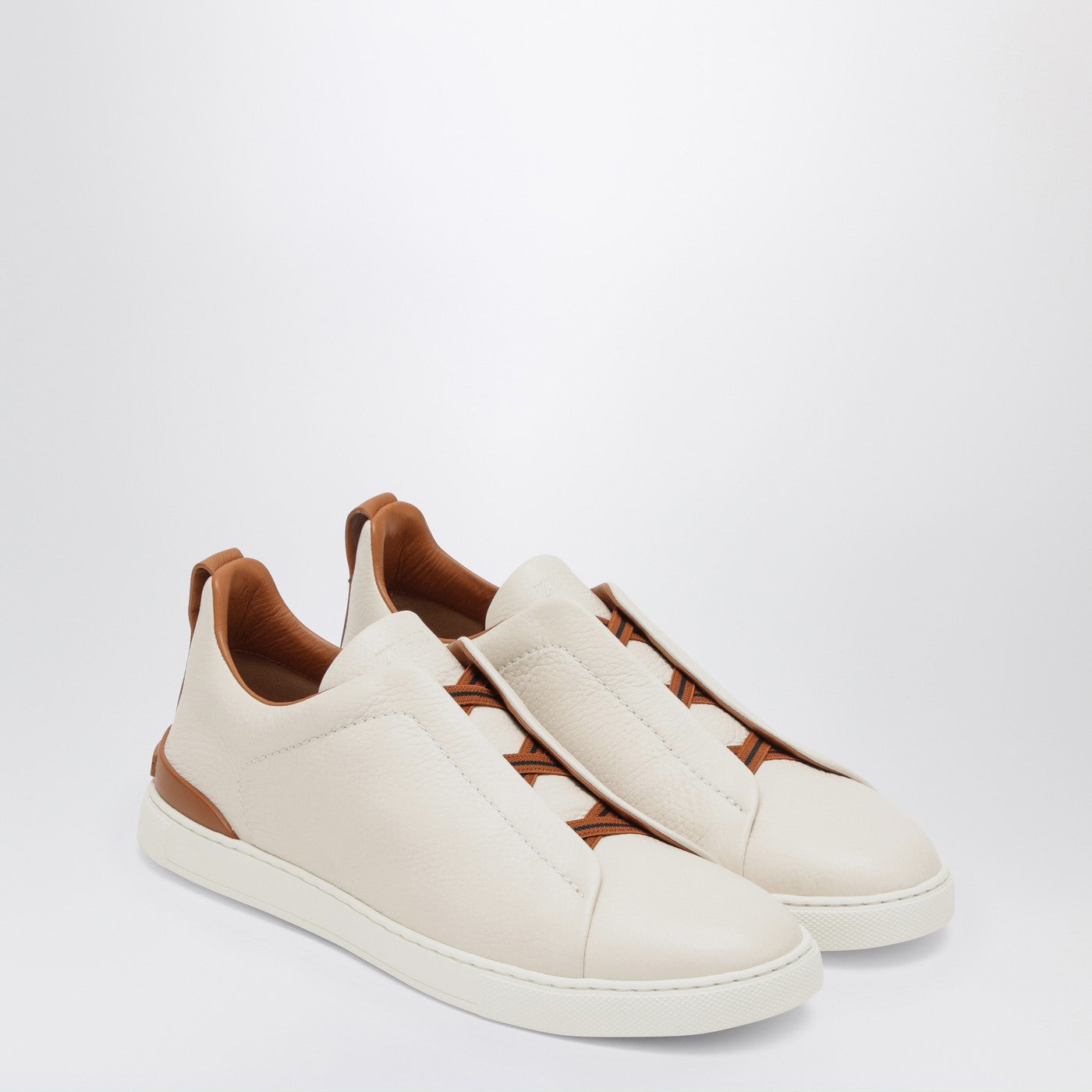 Sneakers Triple Stitch aus weißem Leder