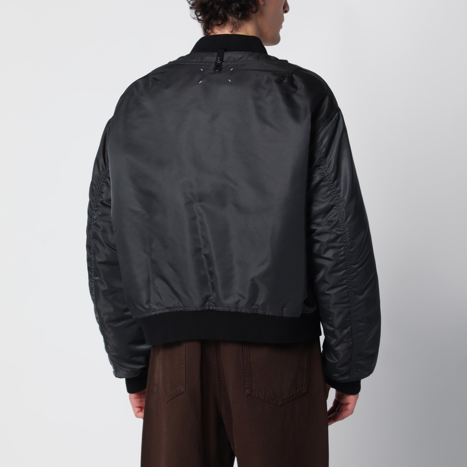 Dark grey reversible bomber in nylon