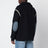 Blauer Wollpullover mit Ellbogenflicken